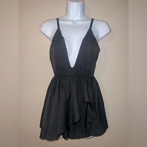 Flawless little black romper!